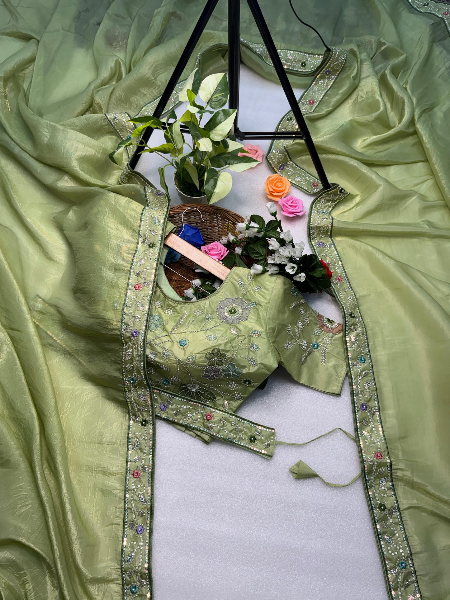 Hand-Embroidered Pure Silk Saree in Mint Green Paired with a Heavily Embroidered Stitched Blouse