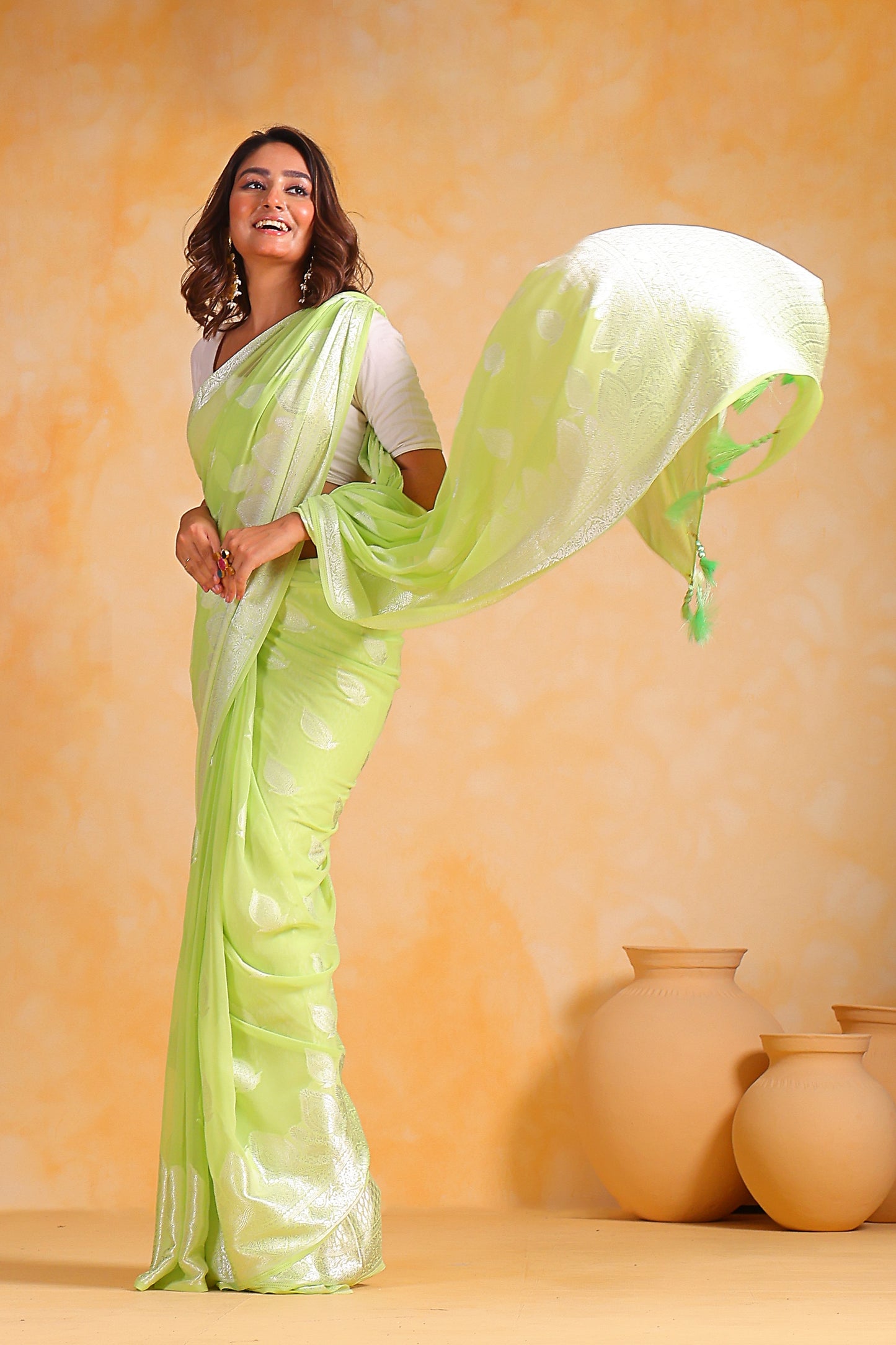Hand-Woven Mint-Green Pure Georgette-Silk Saree with Tassels and Heavy Blouse