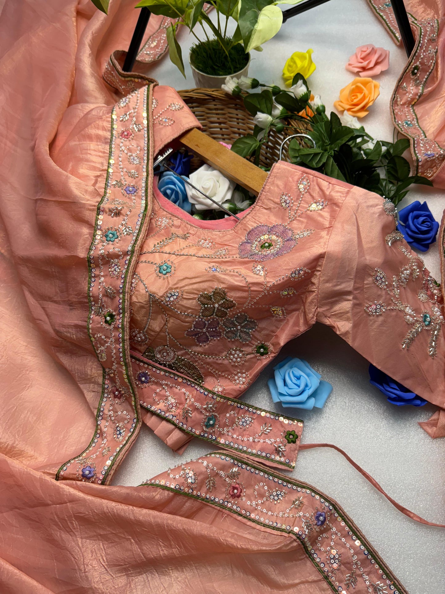 Hand-Embroidered Pure Silk Saree in Vibrant Peach Paired with a Heavily Embroidered Stitched Blouse