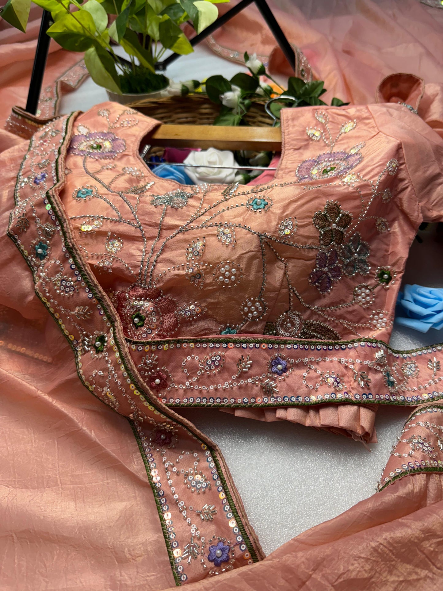 Hand-Embroidered Pure Silk Saree in Vibrant Peach Paired with a Heavily Embroidered Stitched Blouse