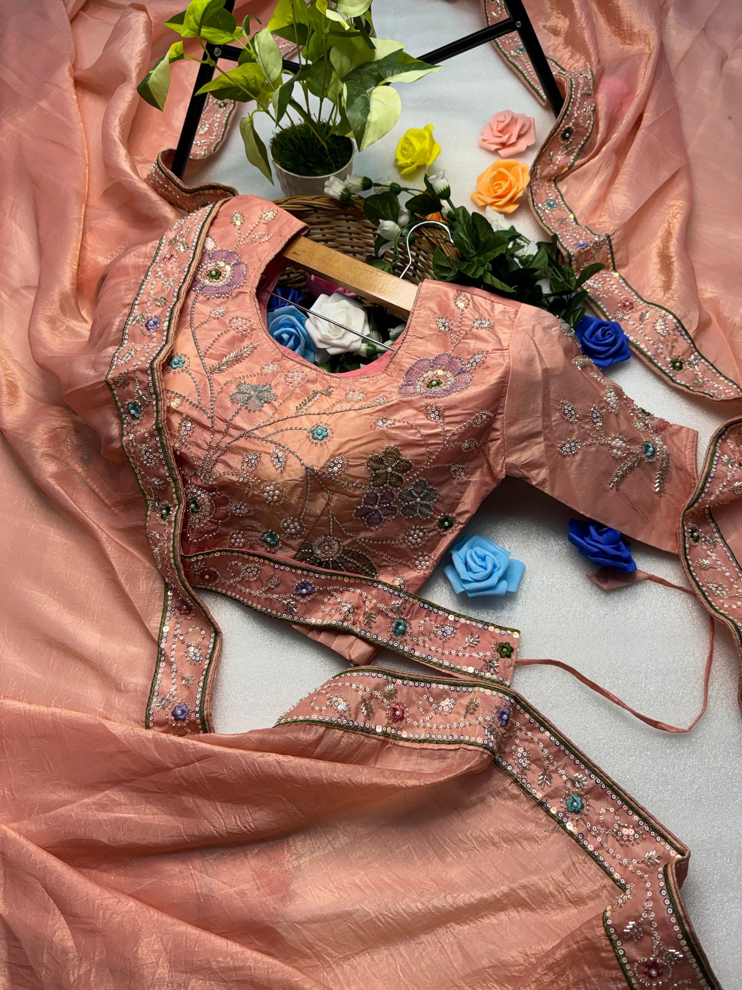 Hand-Embroidered Pure Silk Saree in Vibrant Peach Paired with a Heavily Embroidered Stitched Blouse