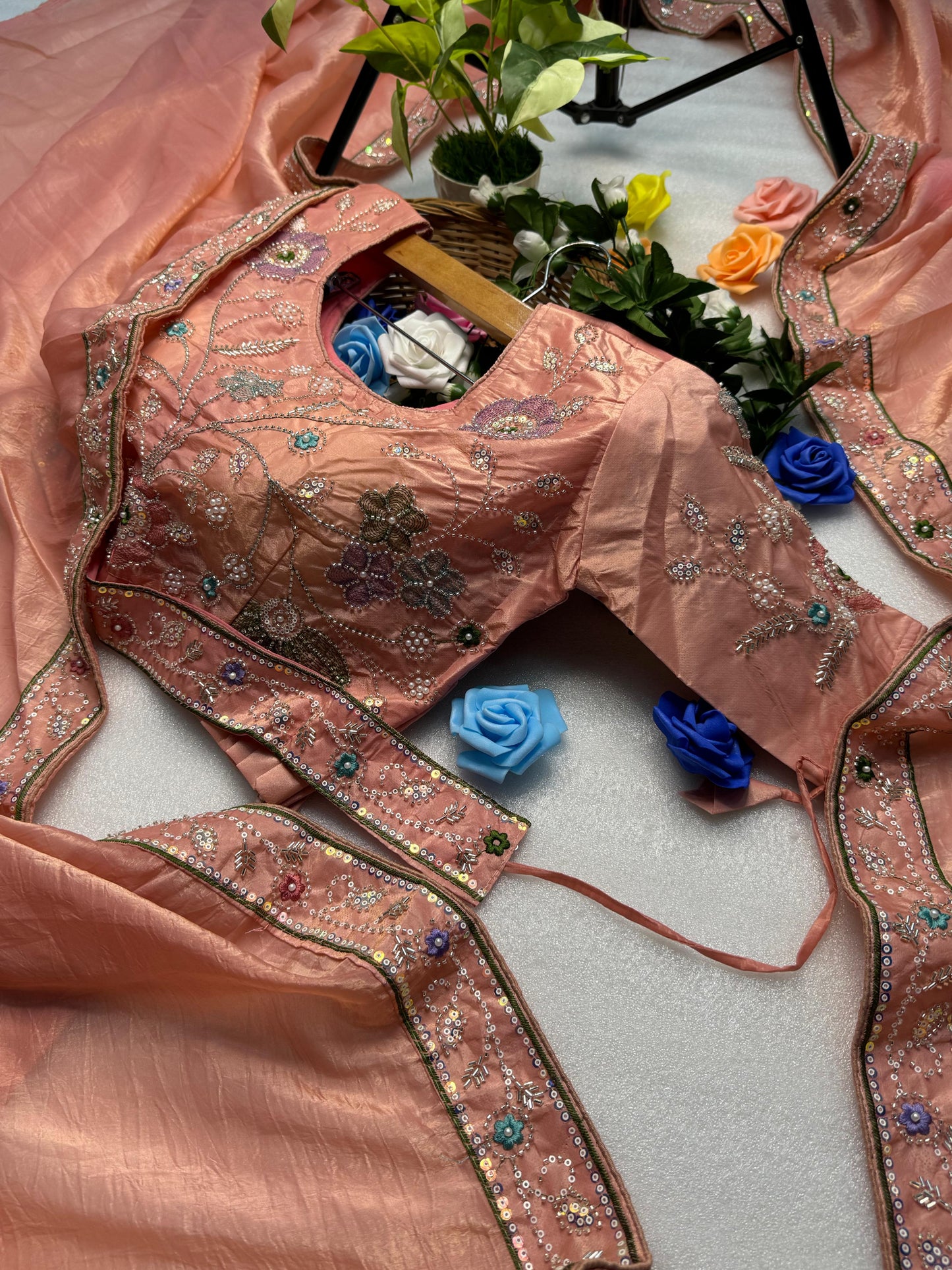 Hand-Embroidered Pure Silk Saree in Vibrant Peach Paired with a Heavily Embroidered Stitched Blouse