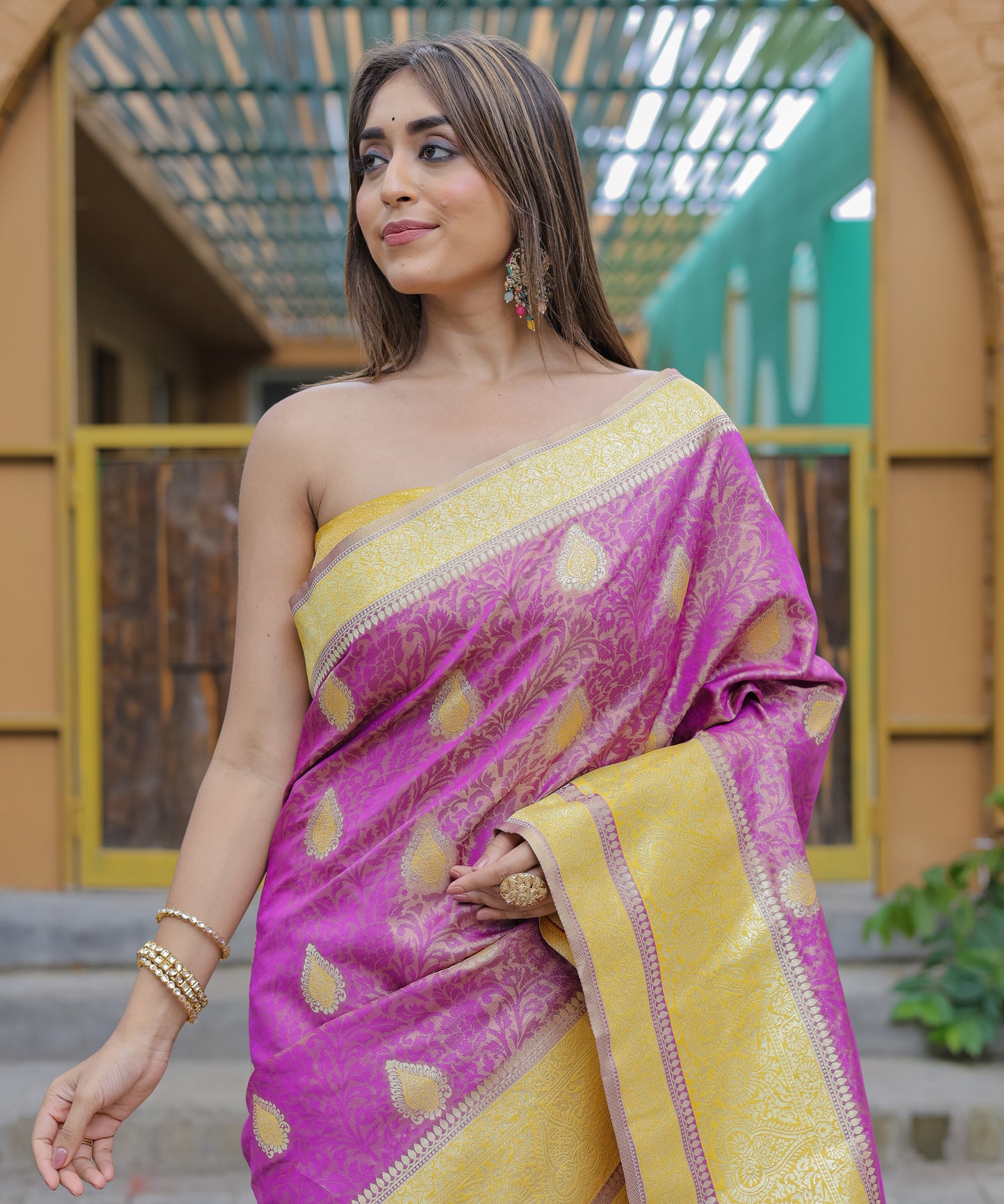 Heavy Embroidered Magenta saree with Sunny-Yellow Zari Border paired with Blouse