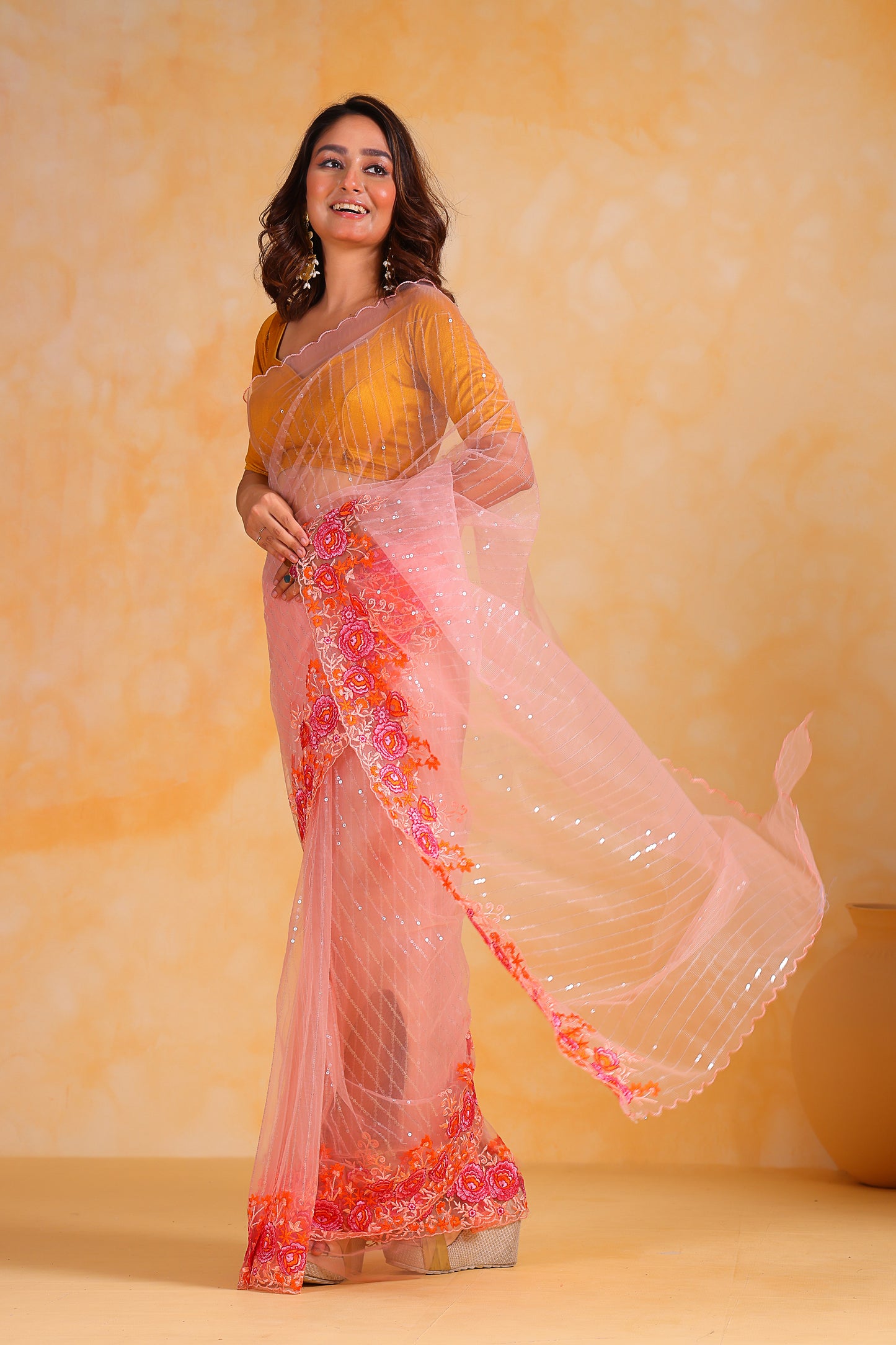 Hand-Embroidered Delicate-Peach Soft Super-Net Saree with All-Over Sequins work & Contrast Blouse