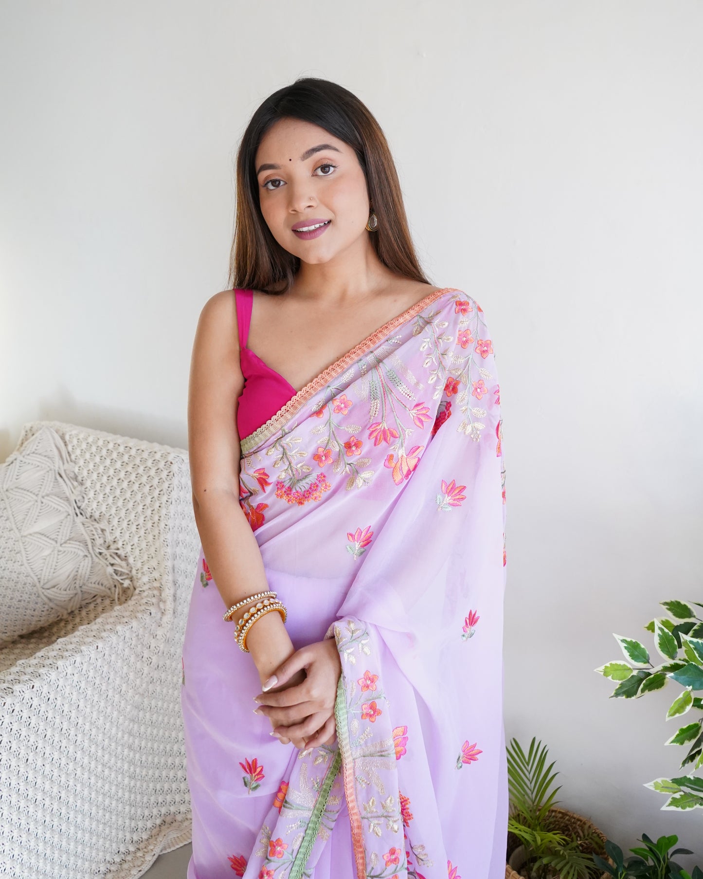 Hand Embroidered Lilac Pure Goergette saree with Heavy Border paired with Satin Blouse