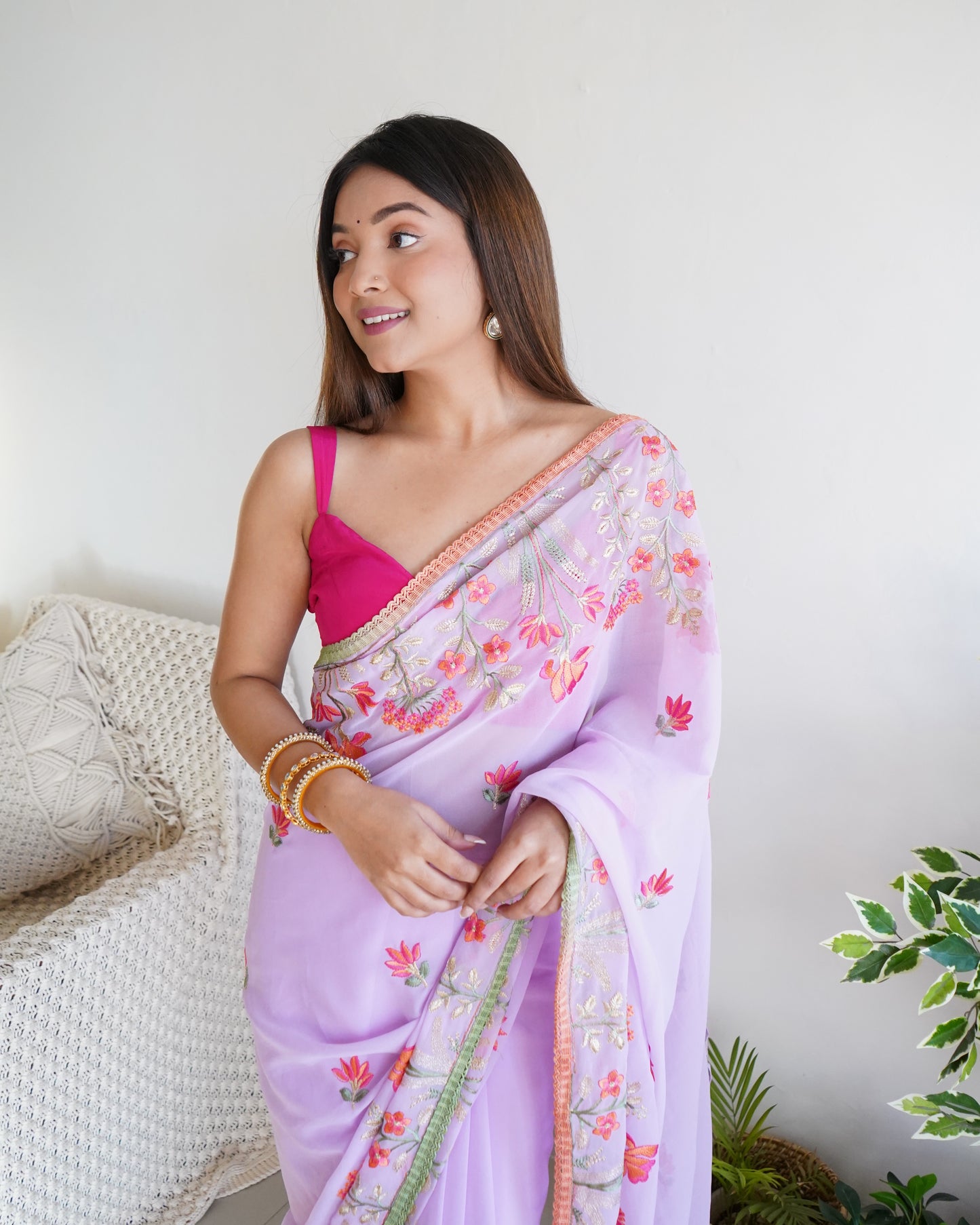 Hand Embroidered Lilac Pure Goergette saree with Heavy Border paired with Satin Blouse