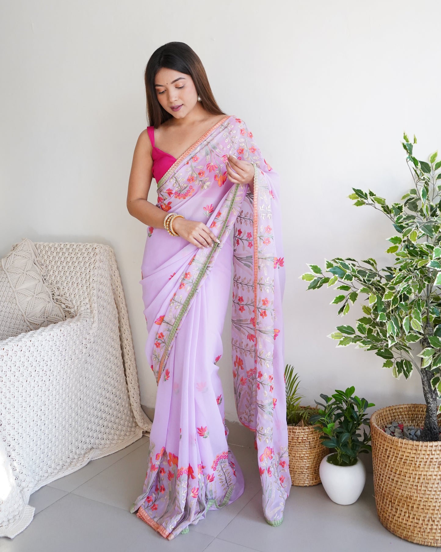Hand Embroidered Lilac Pure Goergette saree with Heavy Border paired with Satin Blouse