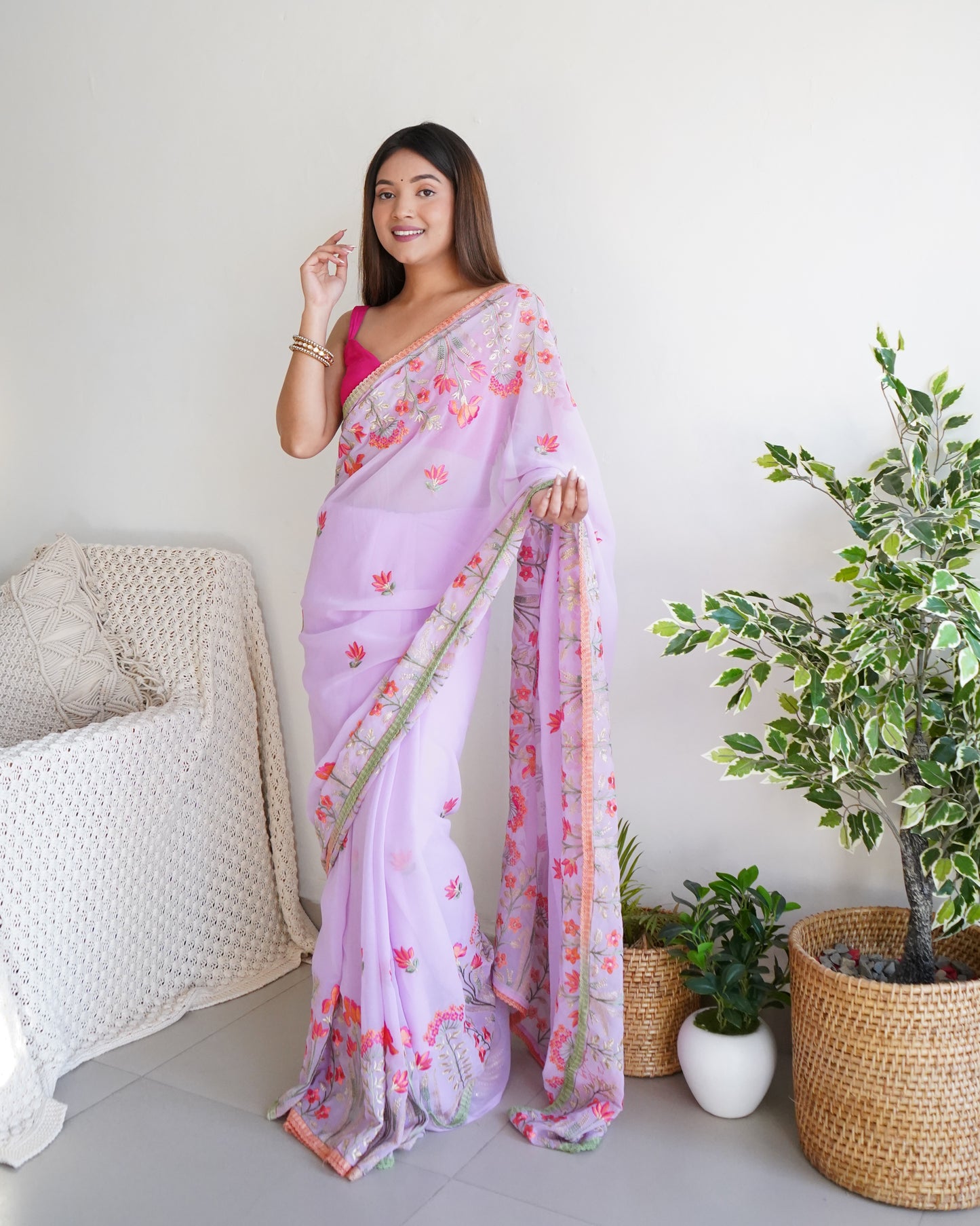 Hand Embroidered Lilac Pure Goergette saree with Heavy Border paired with Satin Blouse