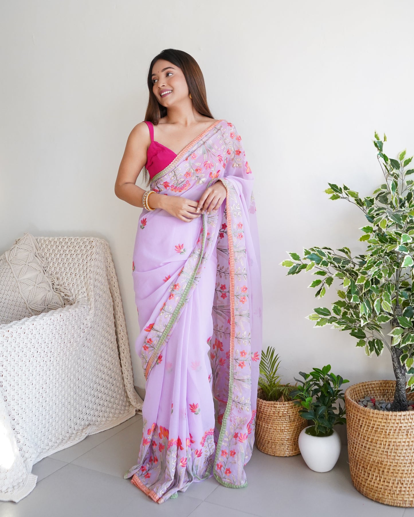Hand Embroidered Lilac Pure Goergette saree with Heavy Border paired with Satin Blouse