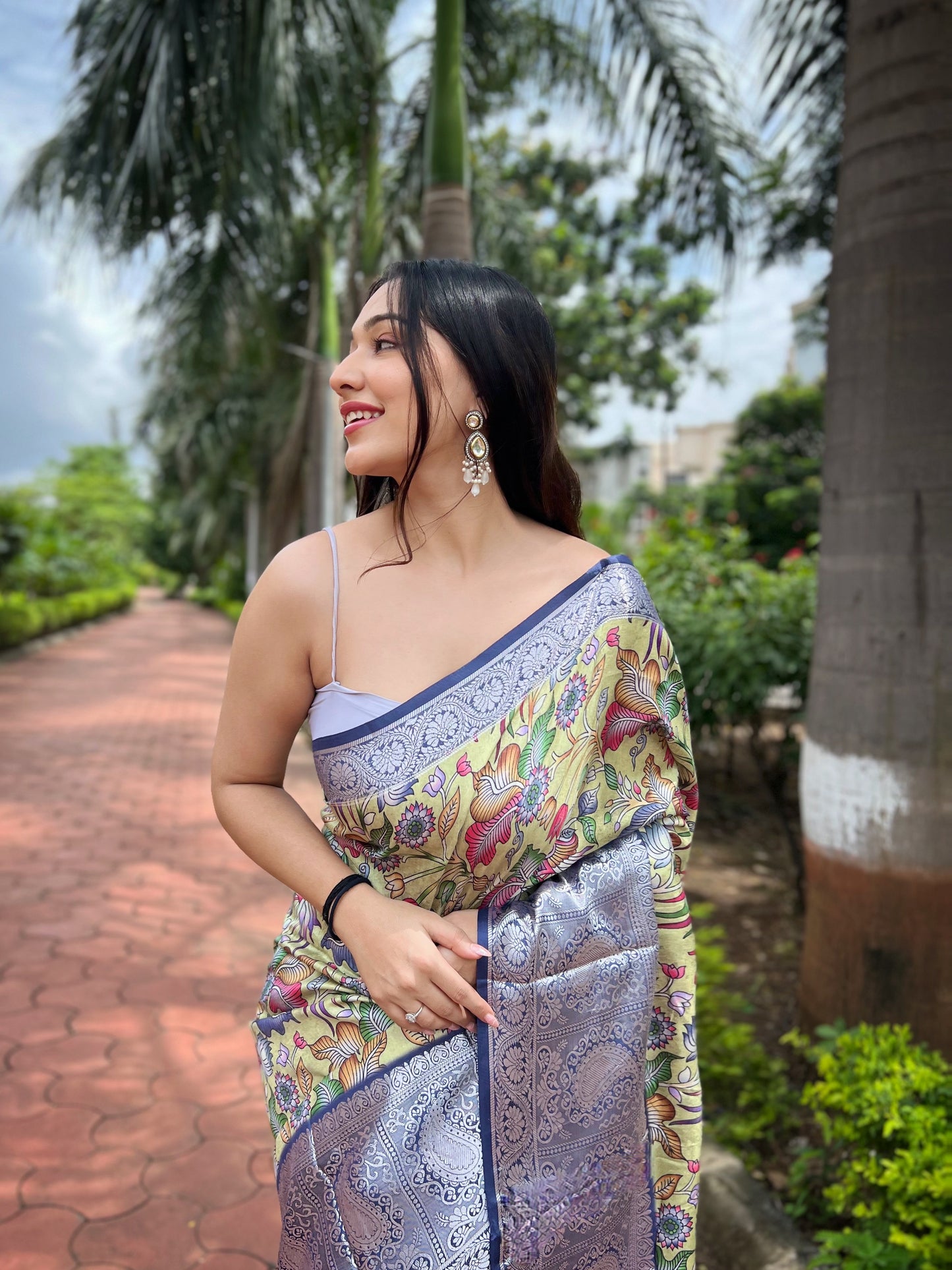 Lemon-Yellow Pure Tussar-Dola Silk saree with Navy-Blue contrast Zari Border and Tassels paired with Contrast Blouse