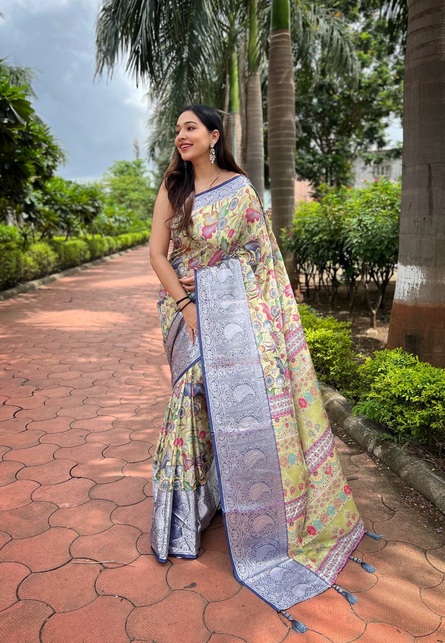 Lemon-Yellow Pure Tussar-Dola Silk saree with Navy-Blue contrast Zari Border and Tassels paired with Contrast Blouse