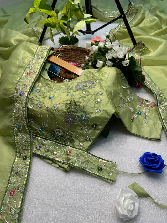 Hand-Embroidered Pure Silk Saree in Mint Green Paired with a Heavily Embroidered Stitched Blouse